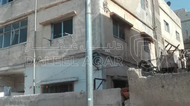 مبنى - ماركا شمالية حي المزارعه  - 100000 دأ