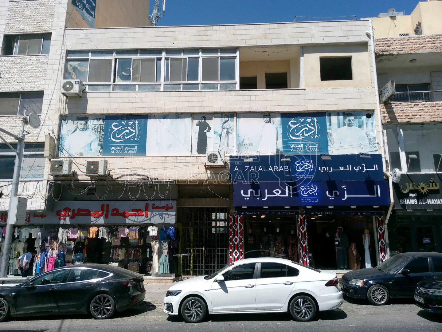 مبنى في صويلح بعد سوق الذهب ب50متر على الشارع الرئيسي - 800,000 دأ - صورة 1