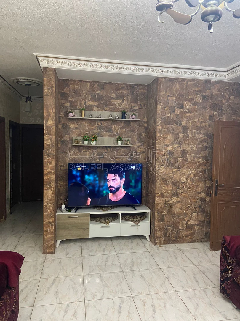 مبنى في الهاشمي الشمالي مقابل وزارة الصحة - 200,000 دأ - صورة 1