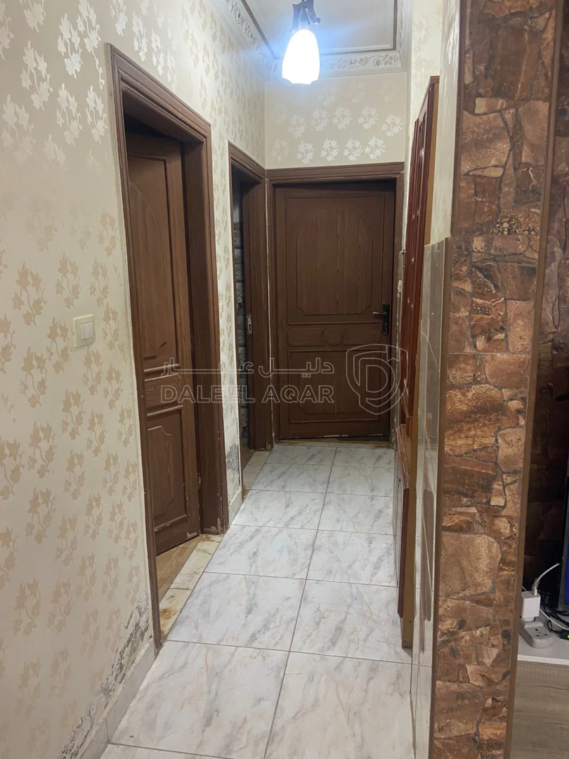 مبنى في الهاشمي الشمالي مقابل وزارة الصحة - 200,000 دأ - صورة 1