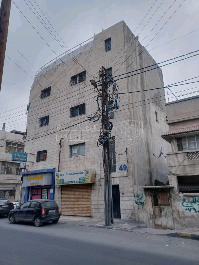 مبنى في عمان جبل النصر الشارع الرئيسي - 250,000 دأ - صورة 1