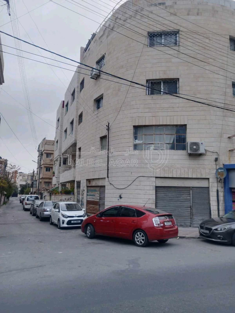 مبنى في عمان جبل النصر الشارع الرئيسي - 250,000 دأ - صورة 1