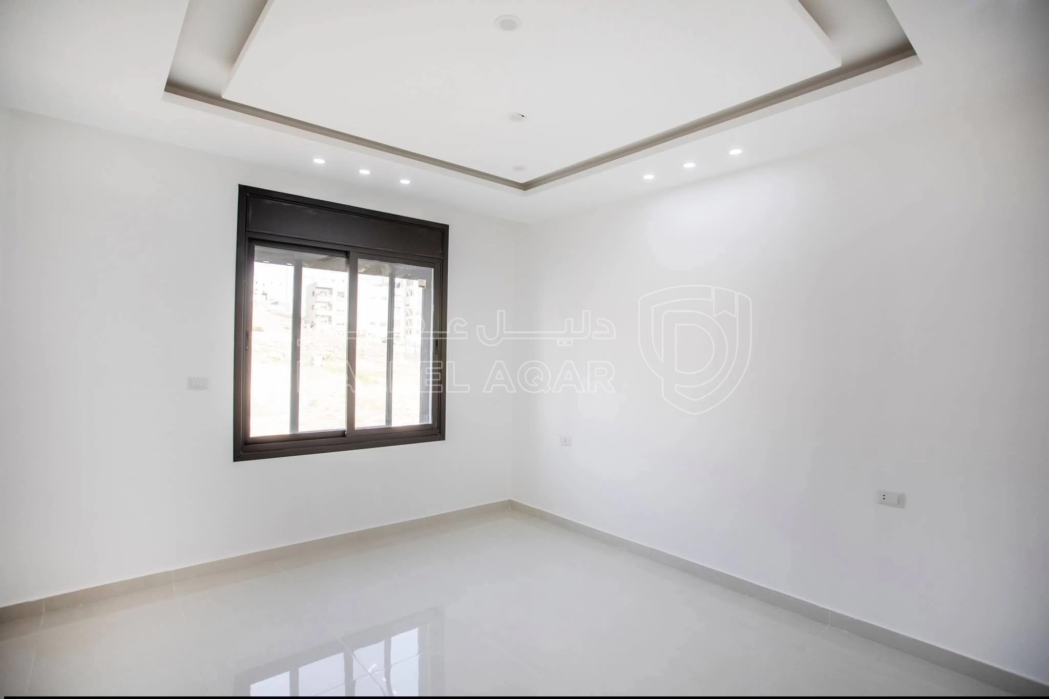 شقة في ابو علندا ضاحيه الفاروق  - 55,000 دأ - صورة 1