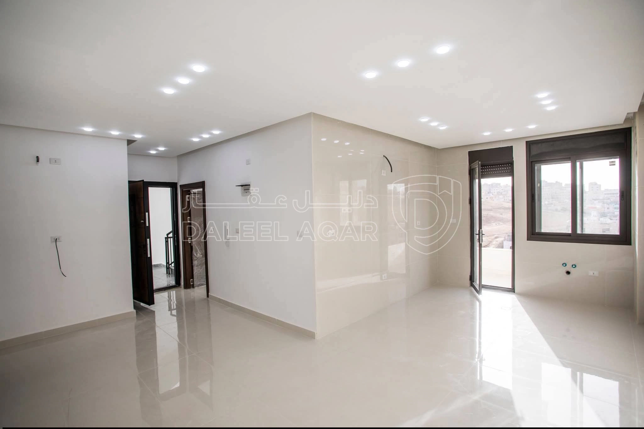 شقة في ابو علندا ضاحيه الفاروق  - 55,000 دأ - صورة 1