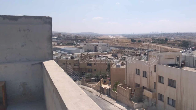مبنى في ماركا الشماليه الاسكان الجديد - 60,000 دأ - صورة NaN