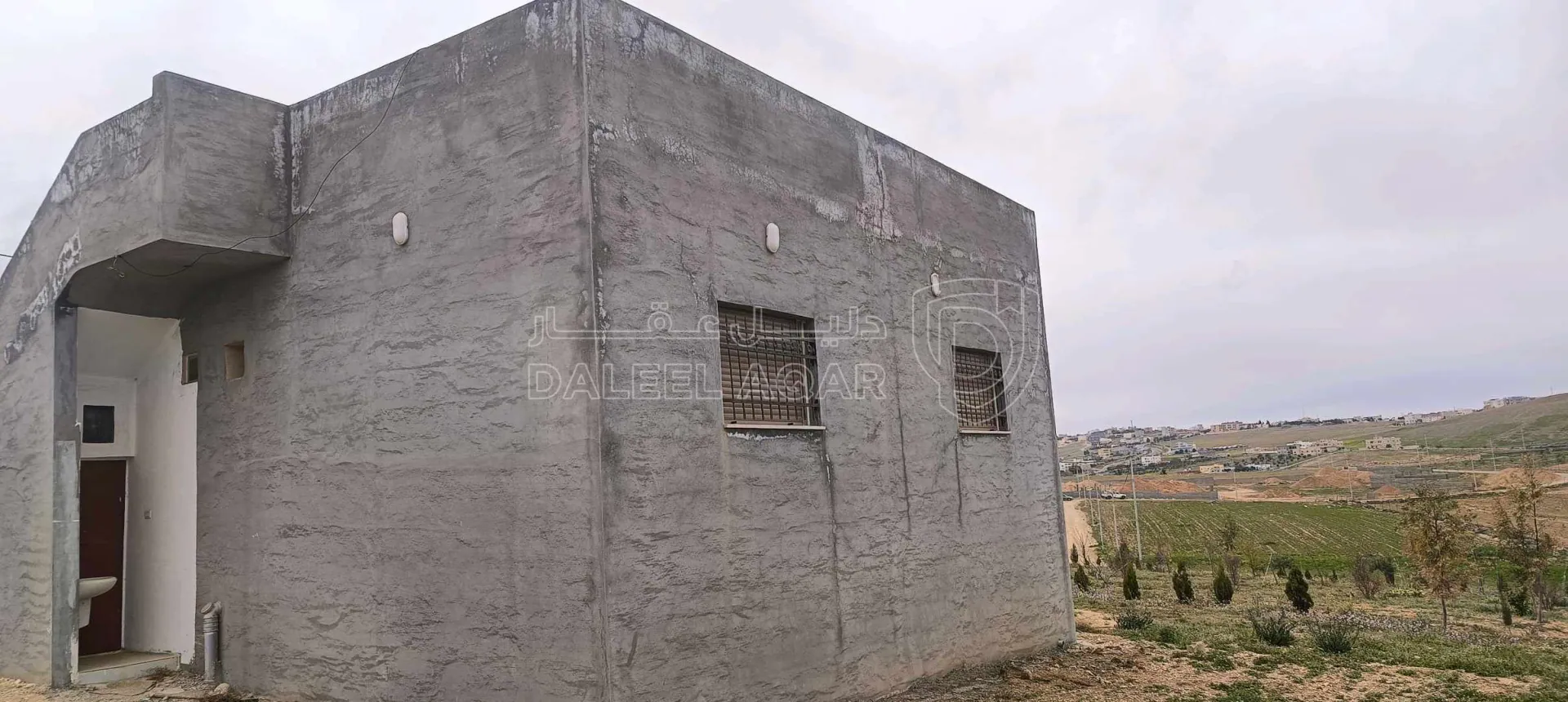 أرض في الطفيلة العيص صويميح - 50,000 دأ - صورة 1