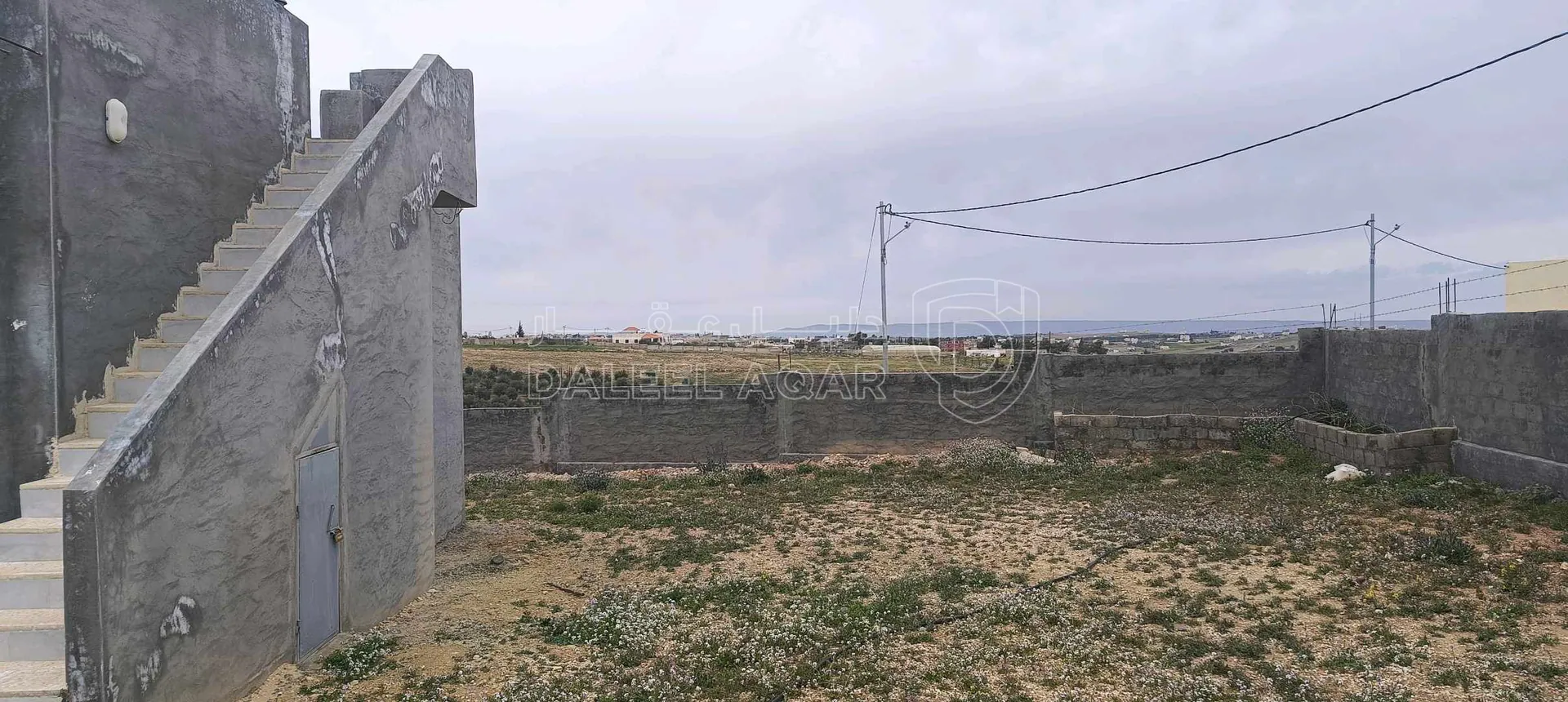 أرض في الطفيلة العيص صويميح - 50,000 دأ - صورة 1