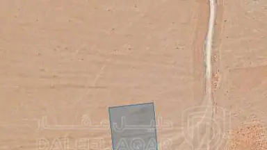 أرض - خلف مطار الشحن قرب إسكان زوانه - 35000 دأ