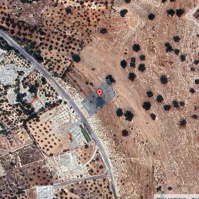 أرض في قرية البصه ضاحية السليحات - 120,000 دأ - صورة 1