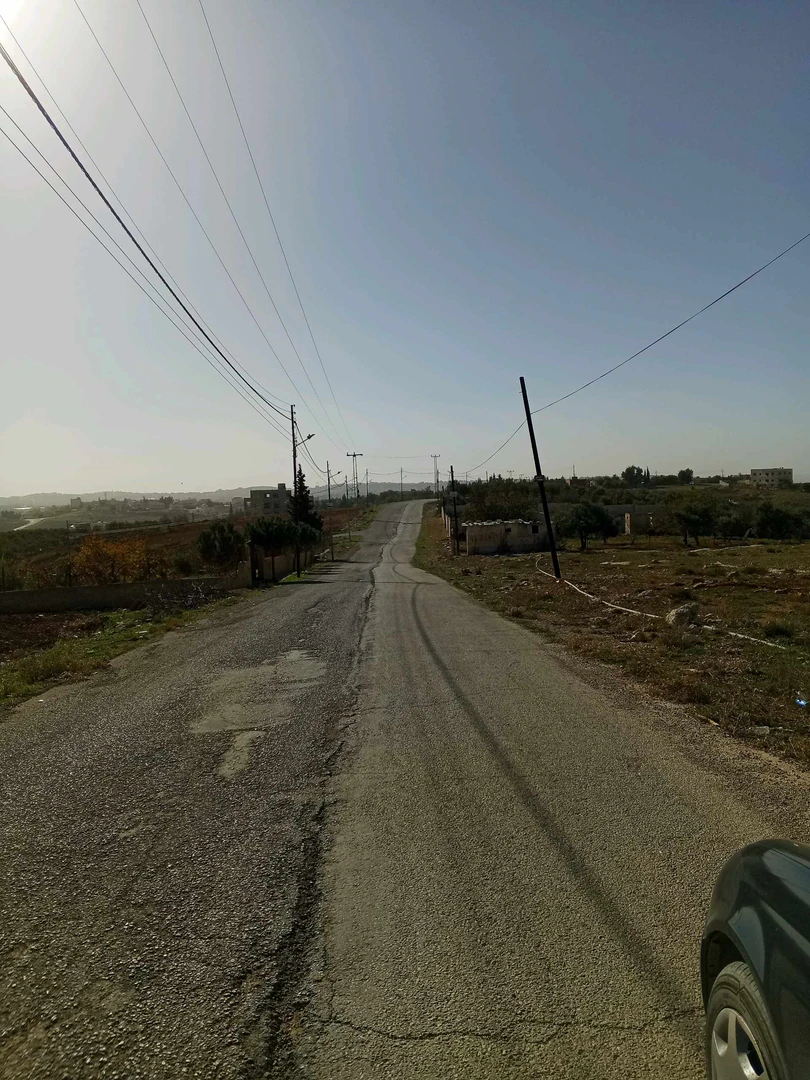 أرض في 1250م ناعور القهاقير ام القطين على شارعين - 175,000 دأ - صورة 1