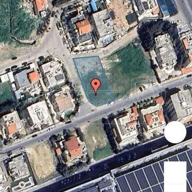 أرض في للبيع ارض ٣ شوارع حنوطيا - 740,000 دأ - صورة 1