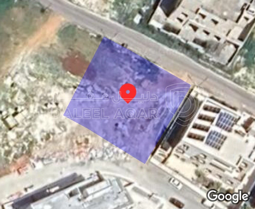 أرض في خلف مدارس العالمية، قريبة من شارع المطار  - 470,000 دأ - صورة 1