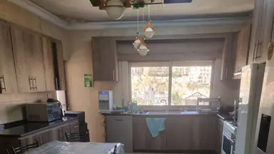 شقة في شقه في ضاحيه الرشيد 295م مع روف للبيع  - 100,000 دأ - صورة NaN