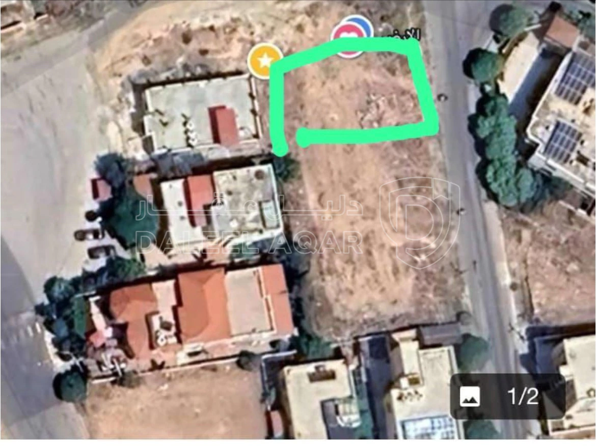 أرض في طبربور  دوار النخيل قرب فندق القوات المسلحة  - 65,000 دأ - صورة 1