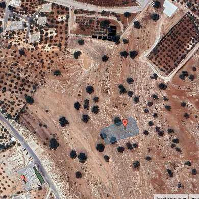 أرض في قرية البصه ضاحية السليحات - 120,000 دأ - صورة 1