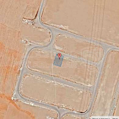 أرض في قرية الصلاحية - امتداد طريق المطار - 25,000 دأ - صورة 1