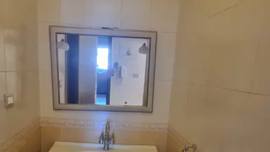 شقة في شقه في ضاحيه الرشيد 295م مع روف للبيع  - 100,000 دأ - صورة NaN