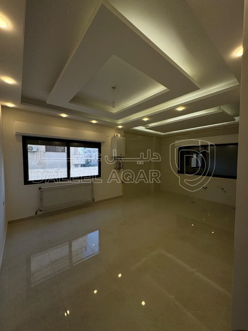 شقة في خلف الجامعة الاردنية  - 64,000 دأ - صورة 1