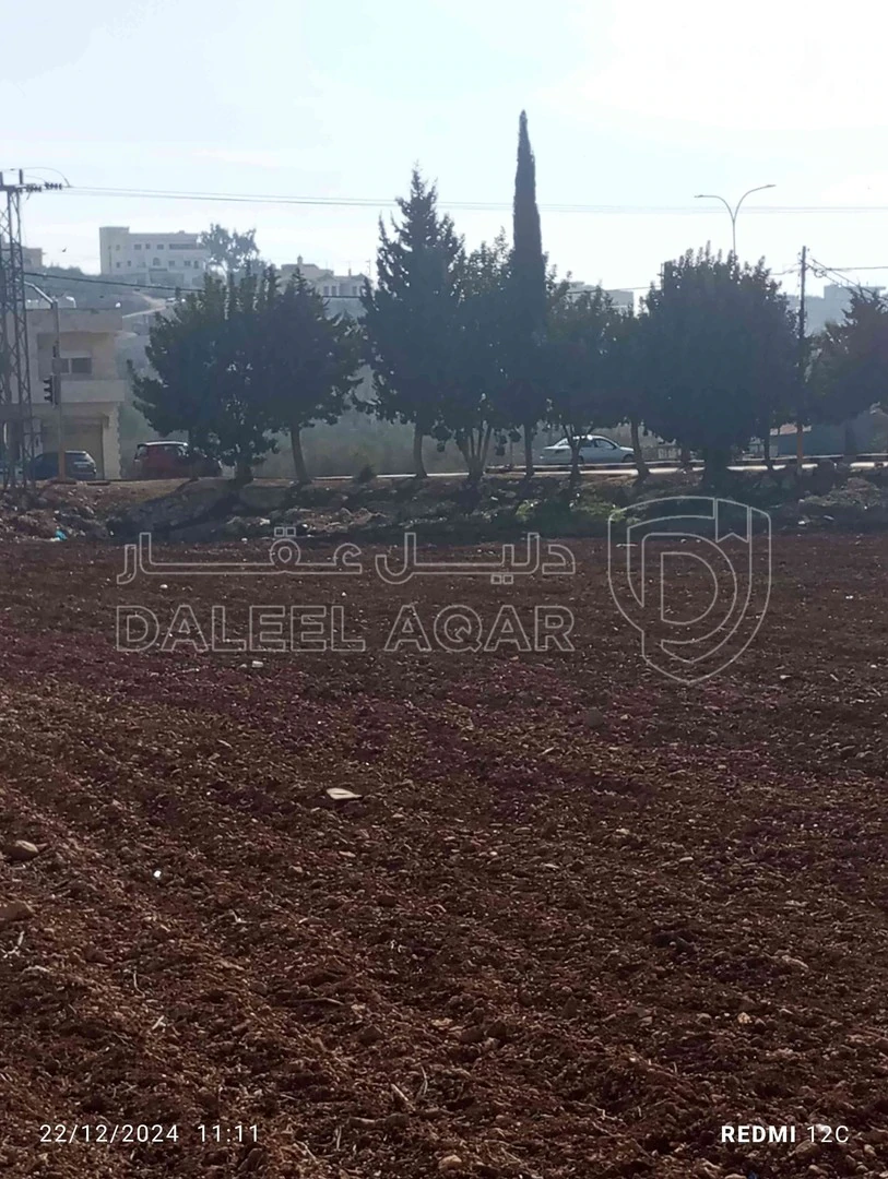 أرض في حسبان الشارع الرئيسي بعد البلديه - 220,000 دأ - صورة 1