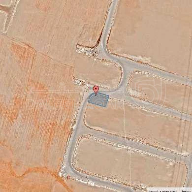 أرض في قرية الصلاحية - امتداد طريق المطار - 27,500 دأ - صورة 1