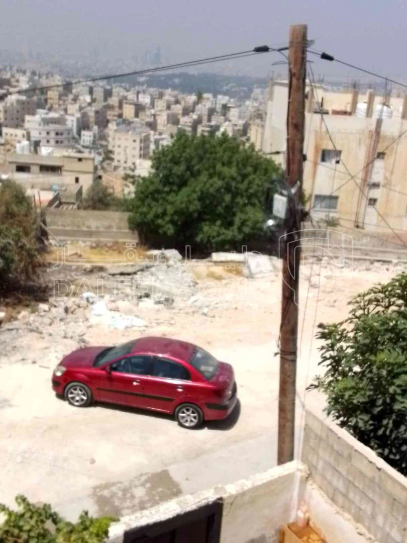 أرض في حي النصر،بالقرب من مسجد الفلاح - 25,000 دأ - صورة 1