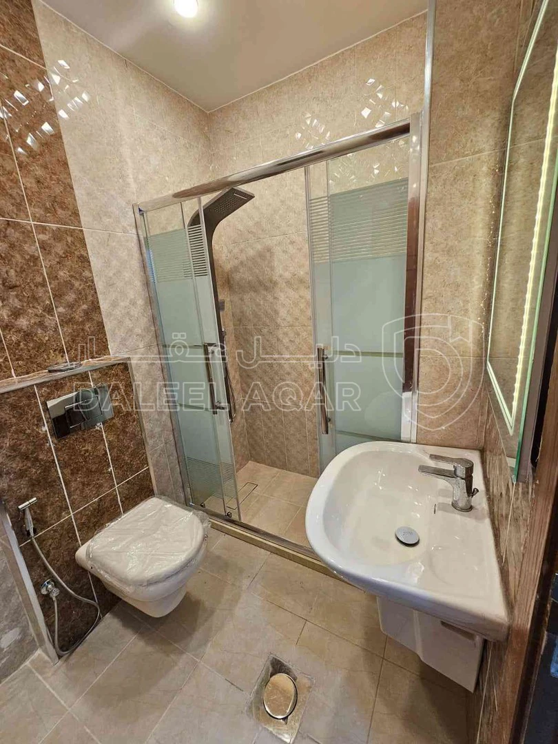 شقة في عماره رقم 11 شارع نمر الحمود - 92,000 دأ - صورة 1
