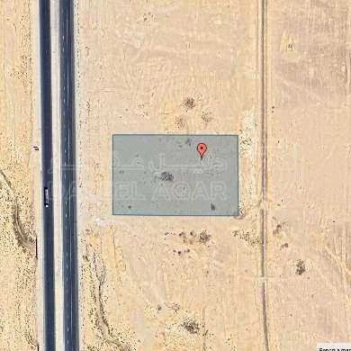 أرض في ارض استثماريه تسع دلمات على الخط الصحراوي مباشره  - 85,000 دأ - صورة 1