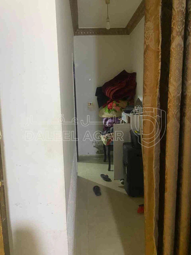 شقة في مقابل البوابة الشمالية للجامعة الاردنية  - 50,000 دأ - صورة 1