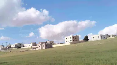 أرض - مشترك محددة داخل التنظيم تحديد حكومي - 15000 دأ