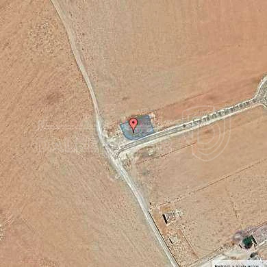 أرض في يبعد 600 متر عن شارع ال 100 - 33,000 دأ - صورة 1