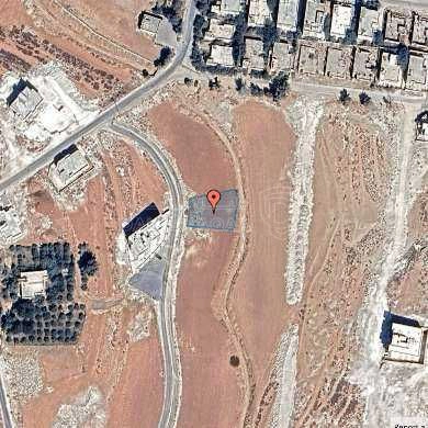 أرض في اراضي ناعور - ام البساتين  - 100,000 دأ - صورة 1