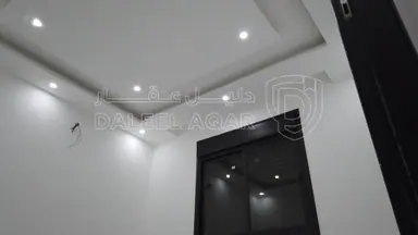 شقة في ‏ALHAKAM HOUSING كاش او أقساط من المالكمشروع مادبا حي الرشاد ((بالقرب من مسجد عيسى أبن مريم))( شقق طابقيه مساحة (174)📌لدينا فريق كامل مجهز في اي وقت للجولات الميدانية وتزويدكم في ادق التفاصيل للمشروع (المشروع جاهزة للتسليم) 🏘️🏘️🏙️ شركتنا مختصة باختيار المواقع الاستراتيجية وفي أرقى المناطق) ________🏘️ مواصفات الشقق بمواصفات ڤلل💯تشطيبات سوبر ديلوكس❇️ مساحة الشقه الاولى 174+220 مساحات خارجيه ❇️ مساحة الشقق (174)م وتتكون من : ✔️ 2 غرف نوم اطفال  ✔️ غرفة ماستر ✔️ 3حمامات ✔️ صالون مع بلكونه✔️ مطبخ مع بلكونه✔️ غرفة ضيوف مع بلكونه 📌مواصفـات الشقة :-🔹المنيوم مقطع خاص Spacer 16m زجاج Double Glaze عازل للحرارة والصوت .🔹اباجورات المنيوم كهرباء معزولة Foam .🔹 بورسلان إسباني نخب أول .🔹 أطقم حمامات معلقة Vetra .🔹 مغاسل كاونتر مع خزائن Laminate .🔹 بطاريات Roca إسباني .🔹 نظام Shower Jet مع قاطع سيكوريت واكسسوارات Stainless steel .🔹 أسقف جبسبمورد مع ديكورات مودرن مميزة لكامل الشقة .🔹انارة Spot light Linear light لكامل الشقة .🔹أبواب قشرة جوز دهان ايطالي .🔹باب رئيسي أمان متعدد الاقفال .🔹دهانات ديكورية للمداخل ودهانات Dulux لداخل الشقة .🔹انتركم  .🔹تمديدات انترنت لكل الغرف .🔹تأسيس كامل للمكيفات لكل الغرف ويشمل النحاس والكهرباء والتصريف .🔹نظام ستلايت مركزي📌مواصفات المشروع :-🔸واجهات وبروزات معمارية مميزة حجر رويشد نخب اول قياس 50 سم .🔸ديكورات للمداخل والادراج وواجهات المصاعد .🔸رخام ايطالي للمداخل والادراج والترسات .🔸مصعد ايطالي Stainless Steel .🔸عزل كامل مائي وحراري لجدران المبنى داخلي وخارجي .🔸موقف سيارة مستقل لكل شقة .🔸خزان ماء اضافي لكل شقة .🔸تشطيبات Super Deluxe .🔸اشراف هندسي كامل على كافة مراحل العمل من التأسيس وحتى التشطيب النهائي .✅ خدمة ضمان ما بعد البيع :-جميع الشقق منفذة باعلى المواصفات الفنية ومكفولة لمدة سنةكاملة 💯.للأستفسار :0777979428 - 75,000 دأ - صورة NaN