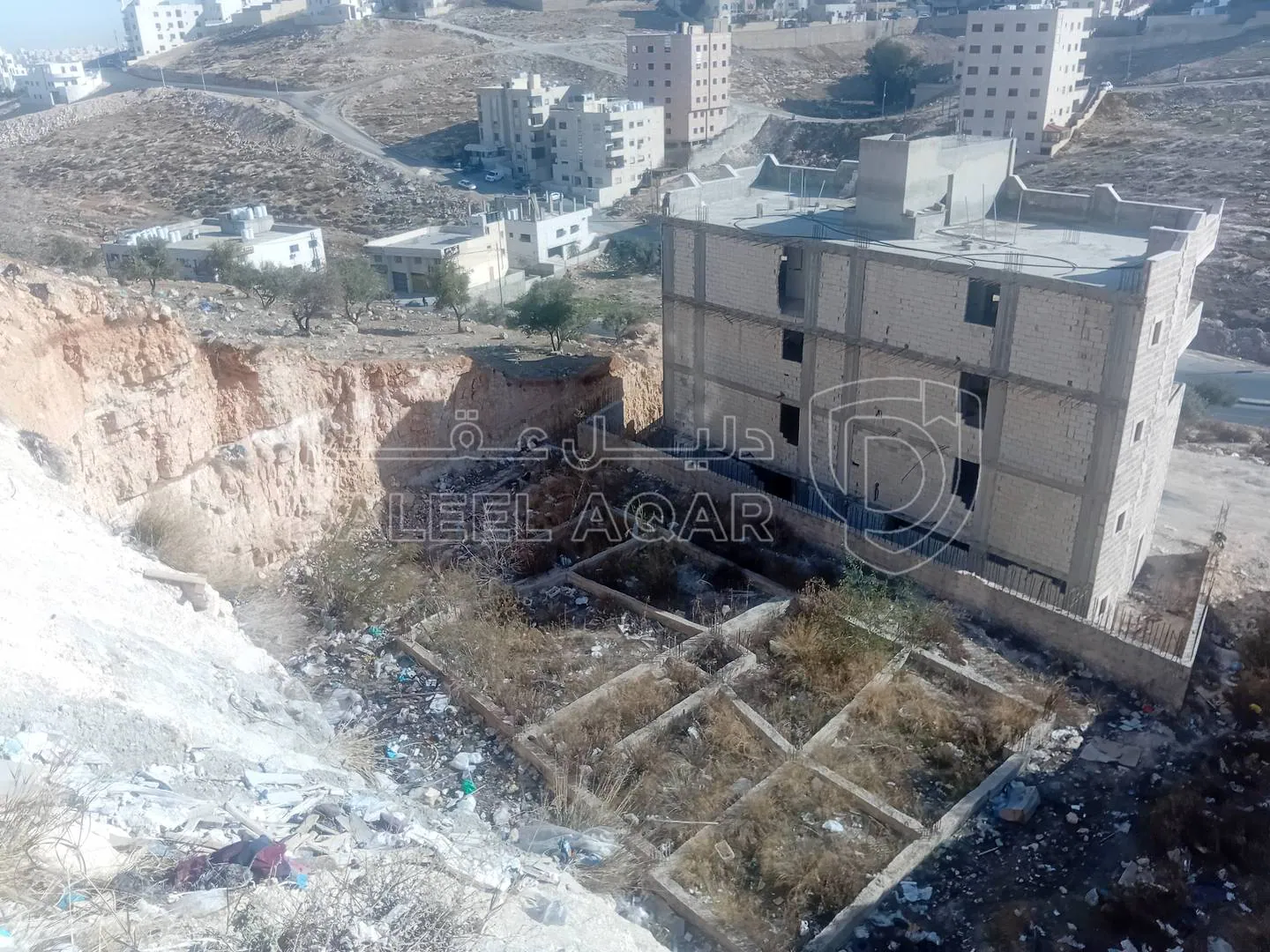 أرض في ابو علندا بين دوار كارفور ودوار البنزين  - 65,000 دأ - صورة 1