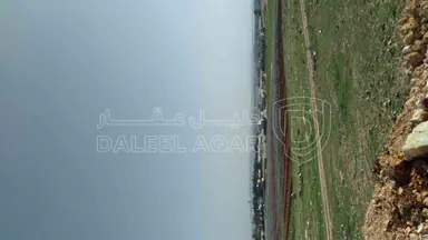 أرض في للبن الحوض قليب مرتفعه مطله على شارع الميه - 105,000 دأ - صورة NaN
