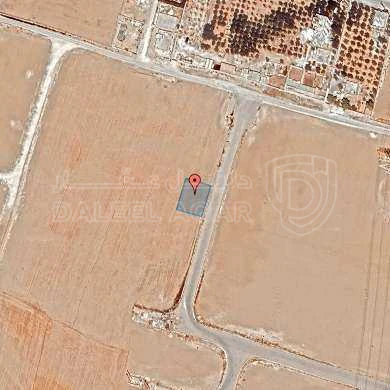أرض في قرية الصلاحية - امتداد طريق المطار - 27,500 دأ - صورة 1