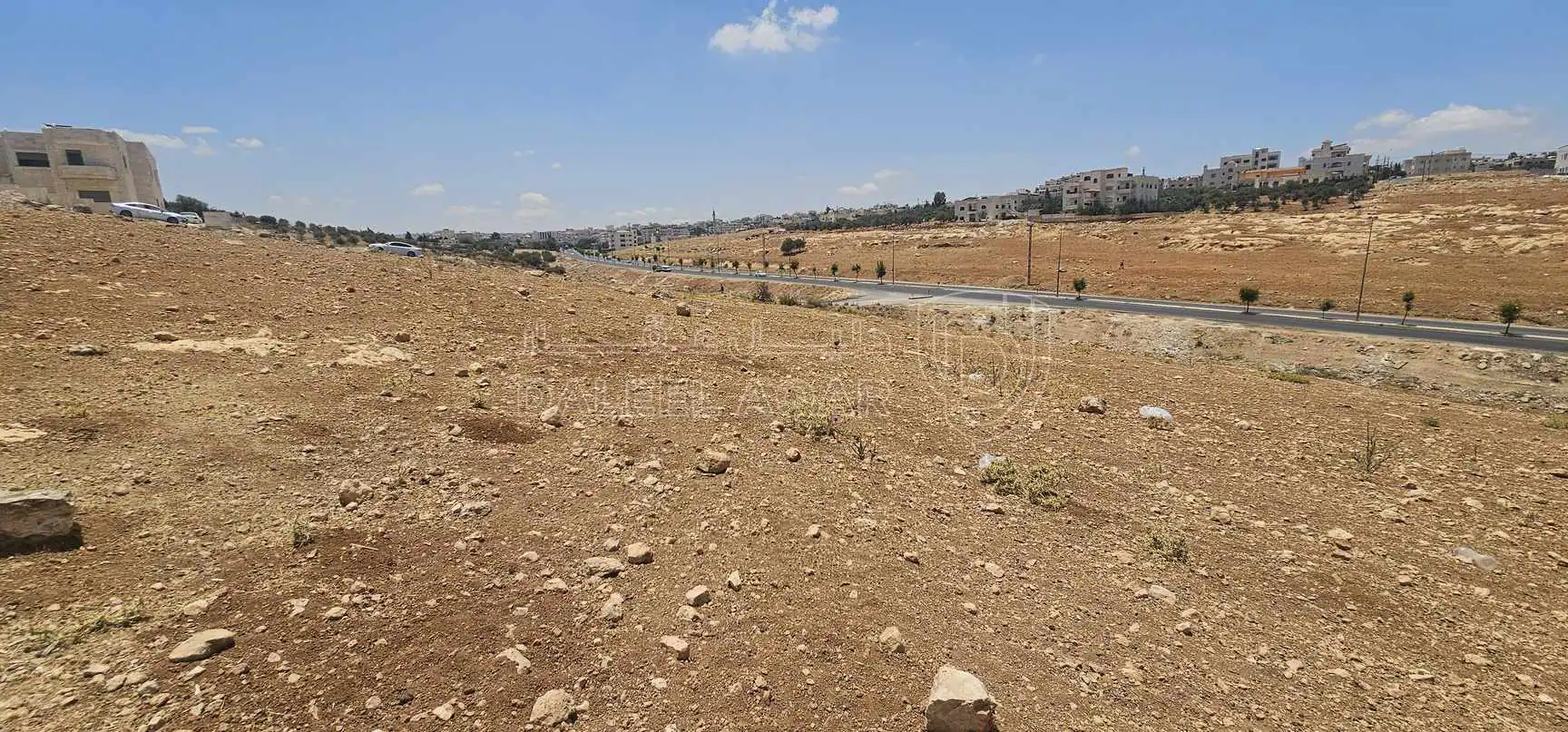 أرض في شارع شفابدران الرئيسي باتجاه عيون الذيب  - 160,000 دأ - صورة 1