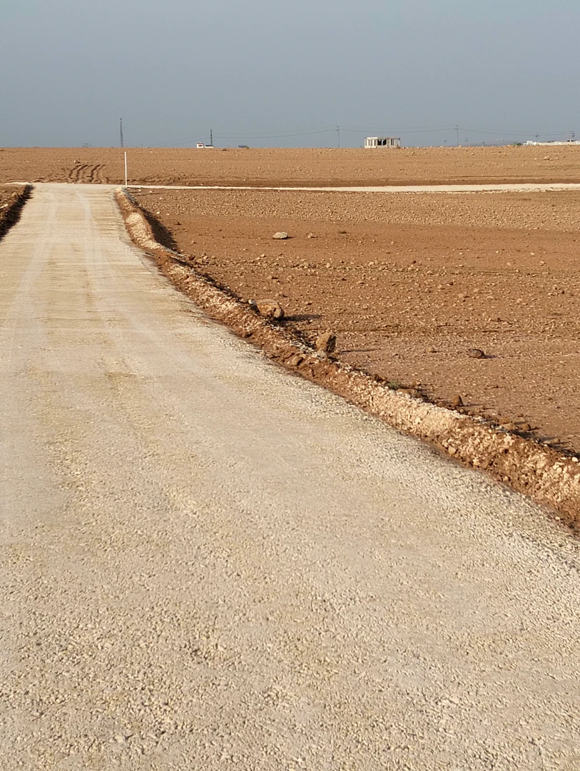 أرض في شرق جامعه العلوم والتكنولوجيا - 70,000 دأ - صورة 1