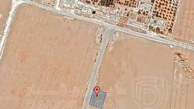 أرض في قرية الصلاحية - امتداد طريق المطار - 27,500 دأ - صورة NaN