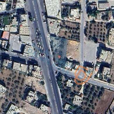 أرض في الحصن الشارع الرئيسي شارع عمان الاشاره الوسطه - 600,000 دأ - صورة 1