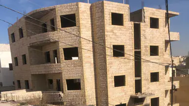 مبنى في عماره بحاجة للتشطيب بسعر جدا منخفض - 170,000 دأ - صورة NaN