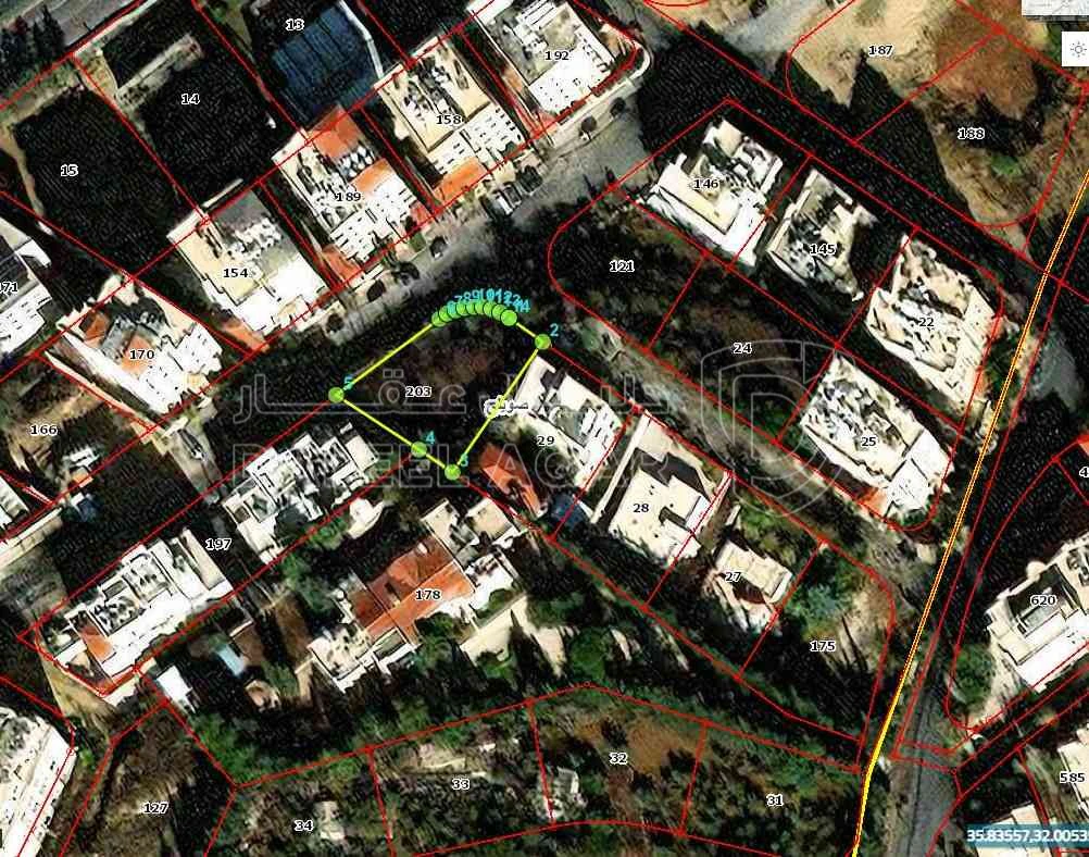 أرض في حي البشائر - شارع سعيد بينو  - 450,000 دأ - صورة 1