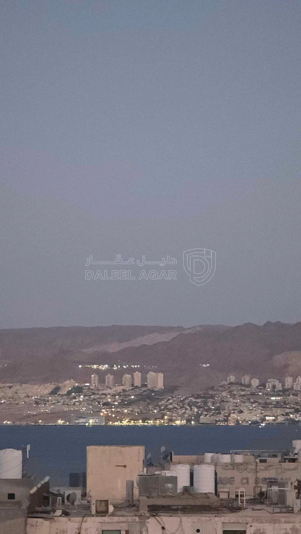 شقة في المنطقة السكنية  الخامسة  - 100,000 دأ - صورة 1