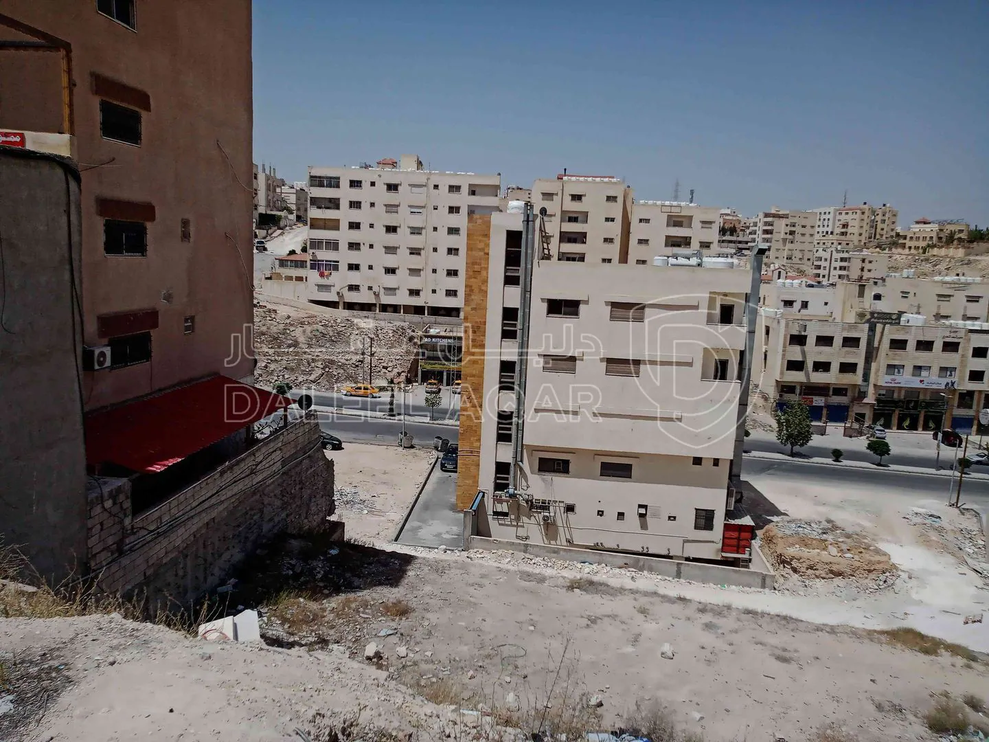 أرض في خلف محطة شحن السيارات الكهربائية شارع الكرامة - 59,000 دأ - صورة 1