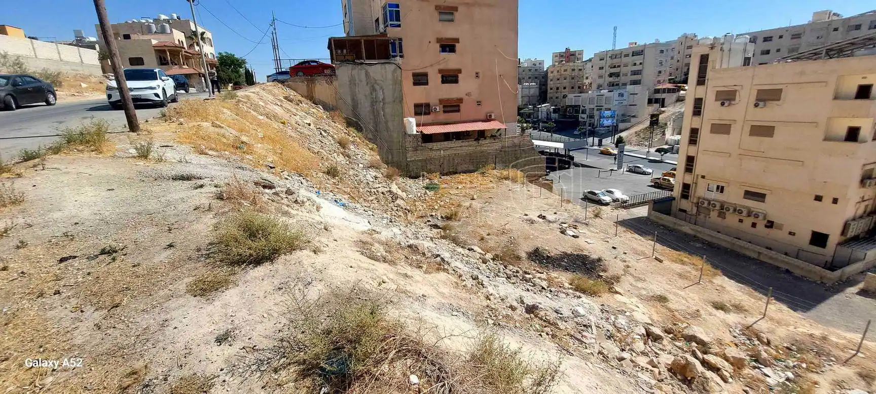 أرض في خلف محطة شحن السيارات الكهربائية شارع الكرامة - 59,000 دأ - صورة 1