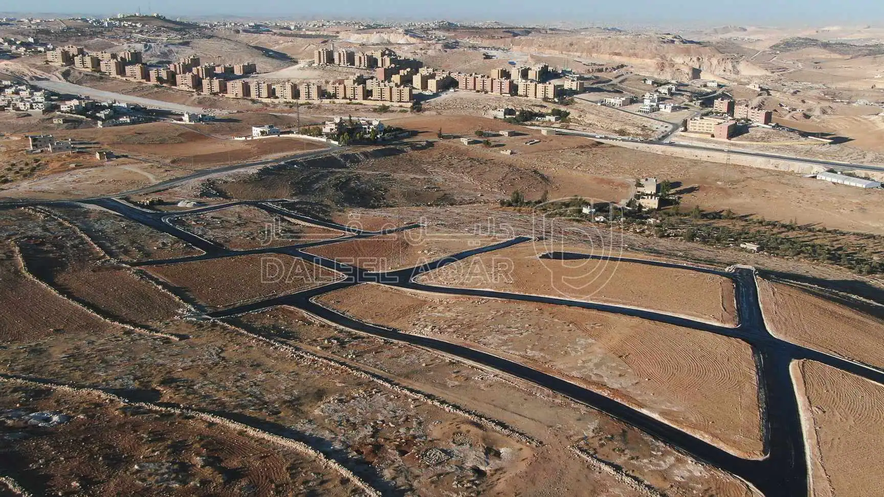 أرض في أرض سكنية بالمستندة الجديدة- 2.5 كم عن اشارة الغاز - 33,000 دأ - صورة 1