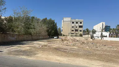أرض في ارض تجاري حي الرونق قرب شركة الحكمة - 525,000 دأ - صورة NaN