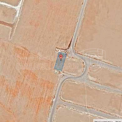 أرض في قرية الصلاحية - امتداد طريق المطار - 27,500 دأ - صورة 1